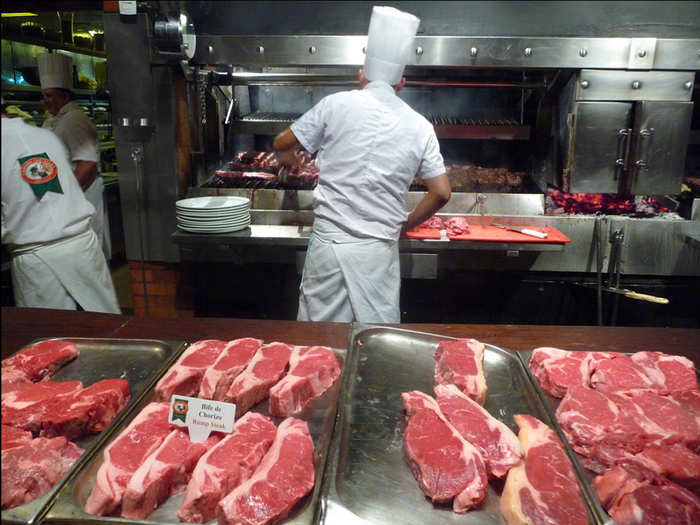 Select your own steak, then watch the grill masters cook it at Cabaña Las Lilas, a famous parilla (grill) in Buenos Aires, Argentina.