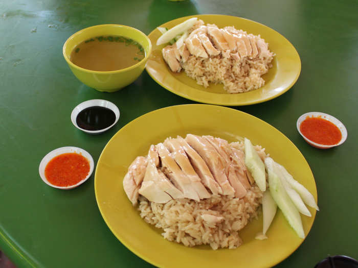 Choose from dozens of different dishes like chicken rice, laksa, satay, and char kway teow, at a hawker center in Singapore.