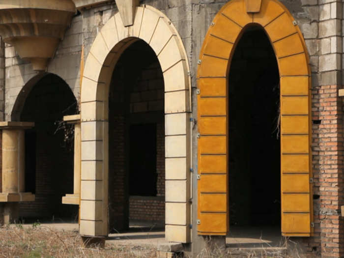 Colorful arches and doorways lead to more deserted areas.