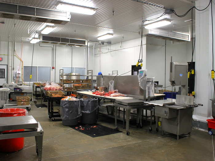 In this room, steaks are cut down, packaged, boxed, and carried out to trucks to be sent all over the country.