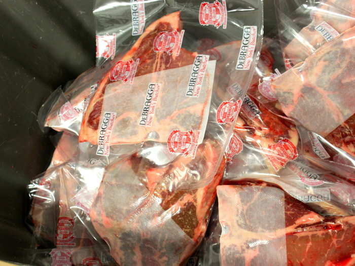 The larger pieces of meat are purchased by restaurants like Tao, while these smaller steaks are packaged, printed with DeBragga