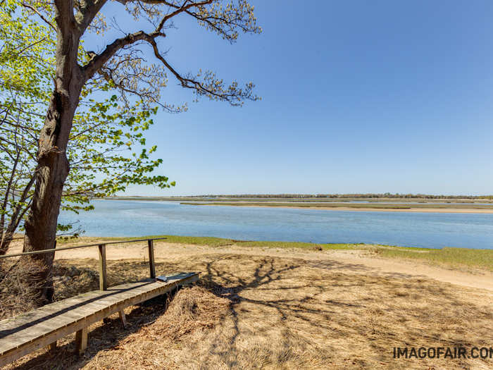 One of the most attractive things about the property is that it comes with a glorious private beach and a boat house as well.