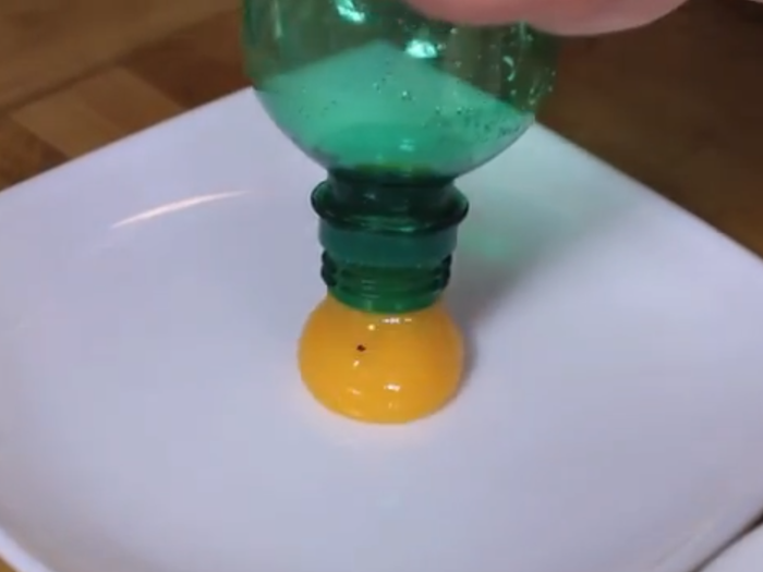 To separate an egg, break it onto a plate. Then, take an empty bottle and gently squeeze to create suction, and suck the yolk into the bottle. Mission accomplished!