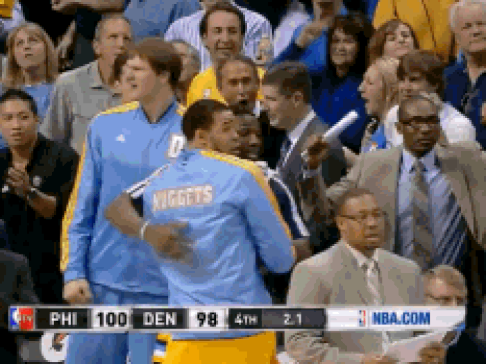 Javale McGee and Kenneth Faried hold each other