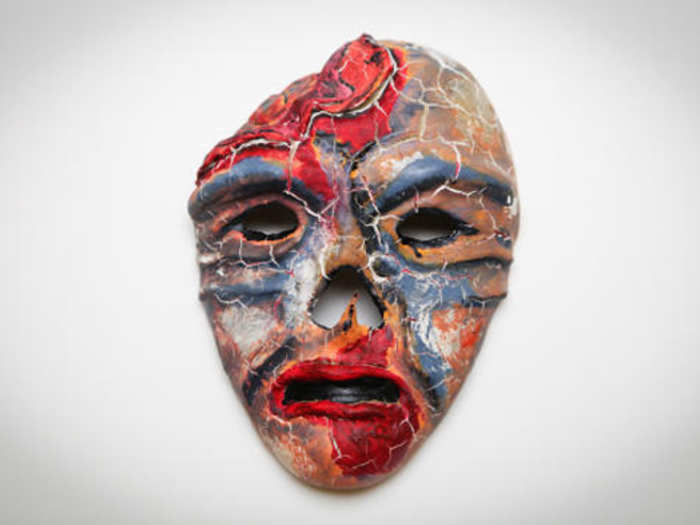 This mask, entitled "The Shock of Death," is about a traumatic incident this soldier remembers. It represents a wounded Iraqi, who walked up to the service member