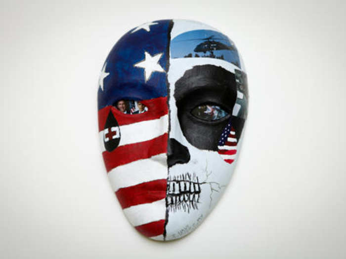 This mask was created by a U.S. Army flight medic, and the words on the mask read, "I have destroyed my life and myself, so that others may live." The mask represents our country shedding tears for our military on one side, and our military shedding tears for our country on the other.