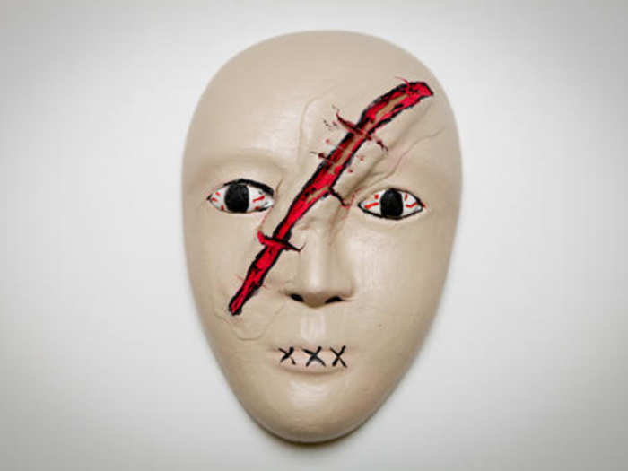 This mask represents the injuries of the soldier who made it and how difficult it is for him to talk about his experiences. The patient included three stitches to symbolize that he felt he was beginning to heal.