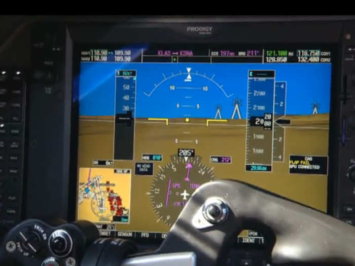 The Phenom cockpit uses the Garmin G1000 Prodigy top-of-the-line flight controls.