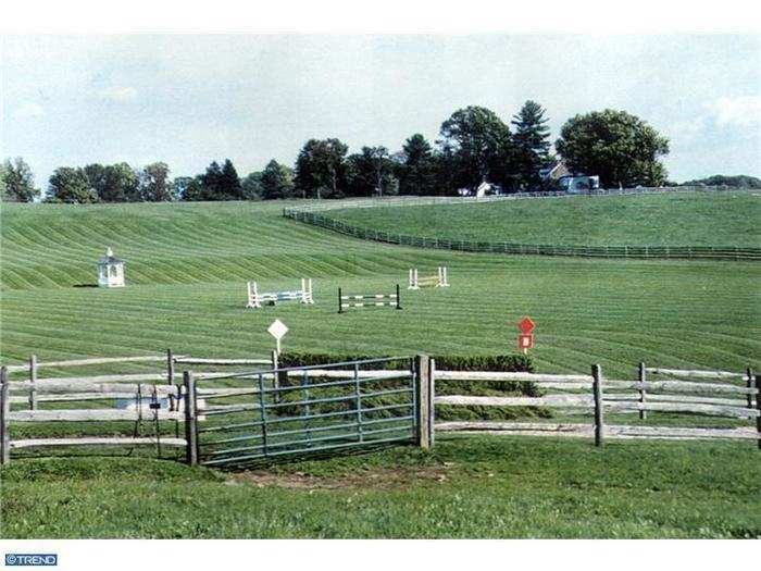 This $17 million farm in Newtown Square, Pennsylvania is split into two parcels, one with the main house, the other with the barn. This home has a shooting range in its basement.