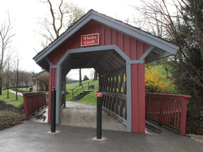 Bill Jr., an engineer, eventually joined the family business after working as a rocket scientist. An engineer with a sense of humor, he designed this covered footbridge without a single right angle, according to Master Distiller Greg Davis.