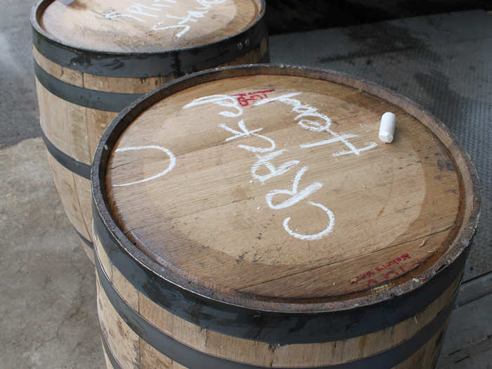 After distillation, the spirit is pumped to the cooperage plant to go into barrels. The barrels, made of aged white oak and charred on the inside, are inspected to make sure there are no cracks or flaws.