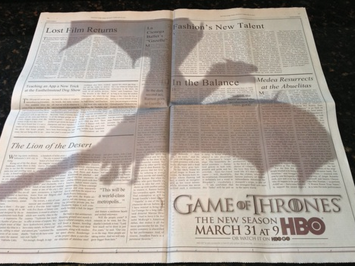 HBO took out a two-page ad, showing a dragon shadow over text, in February for the season three premiere.