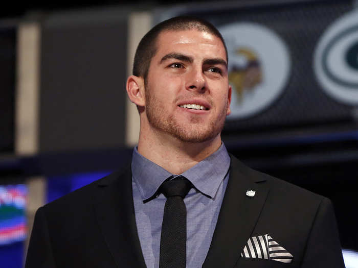 BEST: No.1 pick Eric Fisher wore a simple black suit