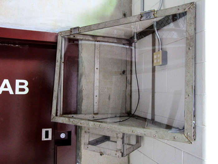 According to Guantanamo officials, this empty container houses a TV in occupied areas. Some containers have an extra slot for a PS3 or DVD player.