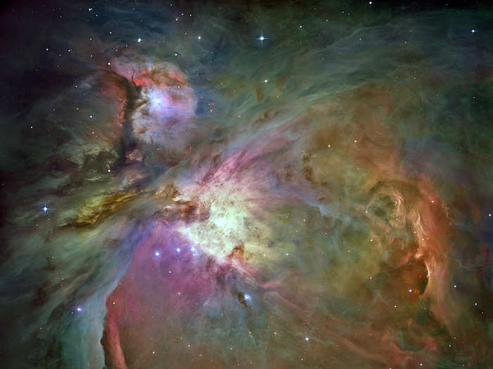 More than 3,000 stars — some of which have never been seen in visible light — appear in this image of the Orion nebula.