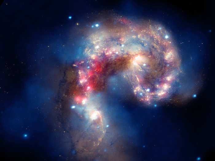 The Antennae Galaxies are a pair of interacting galaxies, located in the constellation Corvus, that are currently going through a phase of starburst.