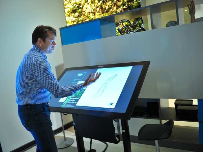 You can take the work that was on your Surface and flick it to the big touch screen table.