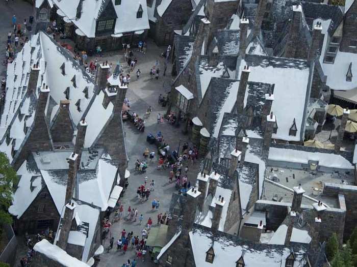 Visitors at the Wizarding World of Harry Potter go on a tour through Hogwarts and Hogsmeade, a wizarding village.