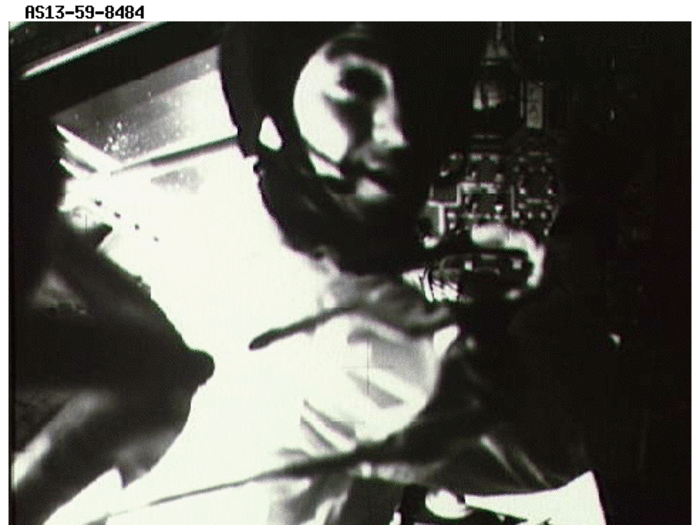 With the command module crippled, the decision was made to move the crew to the lunar module (designed to land on the moon), which would act as a "lifeboat." Lovell is pictured here inside the lunar module.