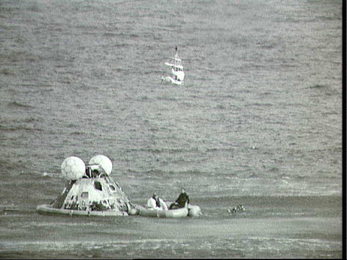 The spacecraft splashes down on April 17, 1970 at 12:07 p.m. The total voyage time was about 142 hours.