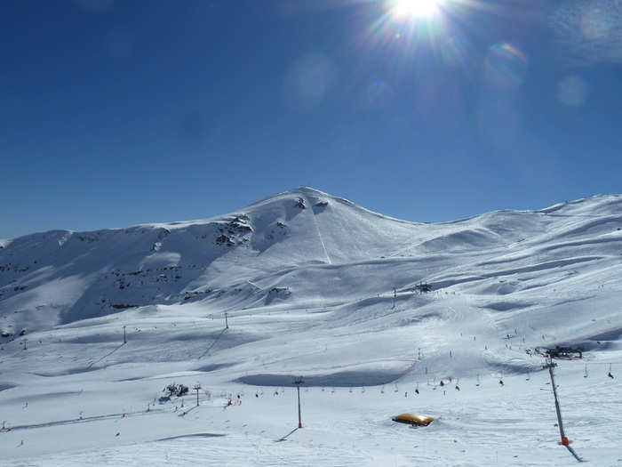 The view from the chairlift is incredible: endless powder-covered mountains just begging to be skied.