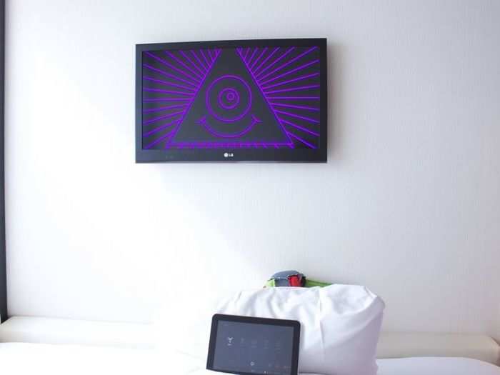 The tablet also lets you decide what mood you want the room to be. Moods can range from "party," which display a psychedelic screen and techno music...