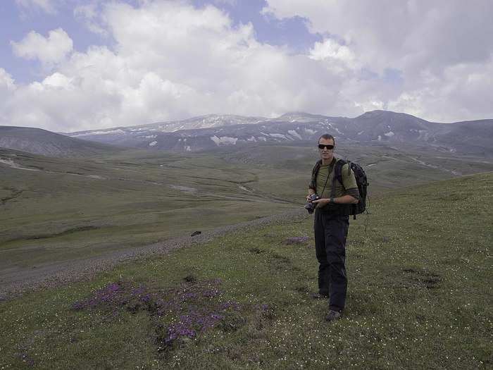 Me standing on the Paektu-gowon plateau in front of Paektusan mountain in July 2012.