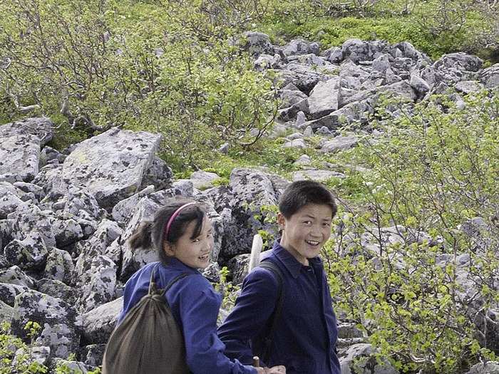 Someone had filled most of our plastic water bottles with acorn soju (distilled wine) instead of water. By chance a brother and sister were effortlessly passing over the mountain and led us to a hidden spring where we replenished our bottles.