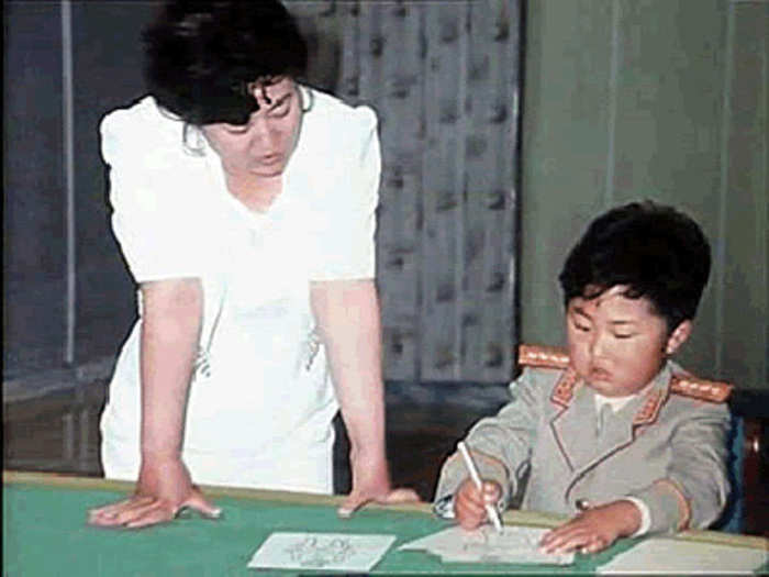 Jong-un (pictured here with his mother) lived at home as a child.