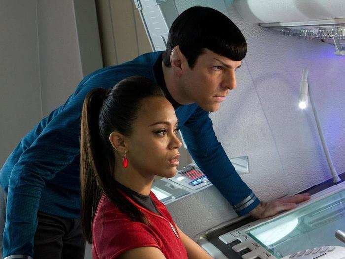 Nyota Uhura (Zoe Saldana) and Spock (Zachary Quinto) look troubled by something as well.