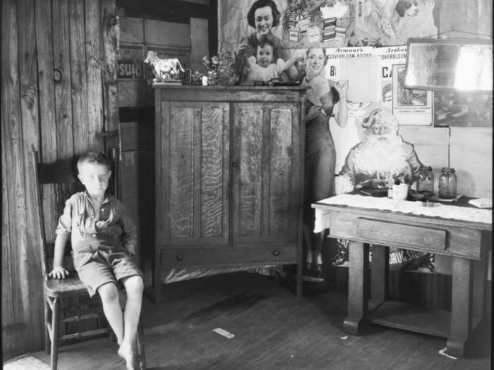 [Barefoot Boy in Chair in Coal Miner’s House, Vicinity, Morgantown, West Virginia] photograph by Walker Evans (1935). "The Met owns the entire archive of Walker Evans. Evans’ photos documenting the coal-mining communities in America are some of the most riveting images that still resonate with us today."