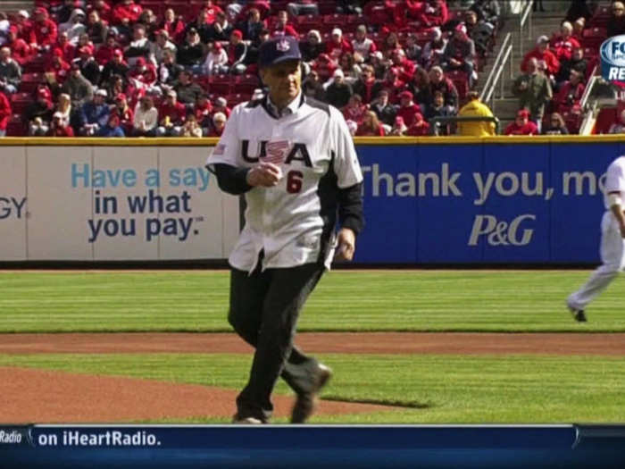 Joe Torre wore his Team USA jersey and cap to throw out the first pitch for the Reds, for some reason