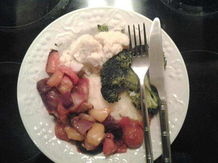 250 calories: Half a head of steamed broccoli, half a head steamed cauliflower, about 12 ounces of mixed roasted vegetables (onion, zucchini, peppers, and tomato), less than 1/2 cup of tomato salsa, and two portions of Smash instant potato.