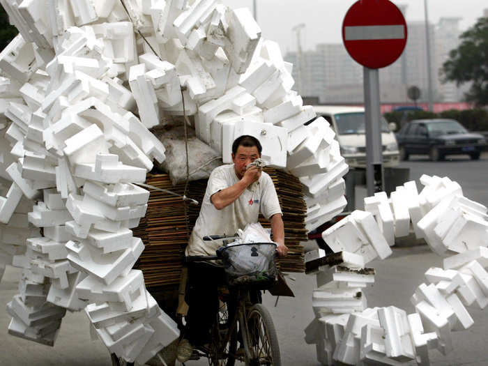 And a Chinese man with recyclable rubbish in Beijing.