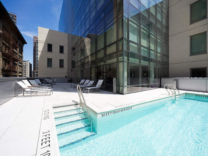 The building has a swimming pool and a gym.