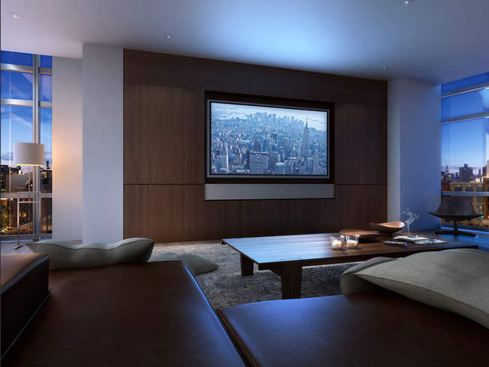 The apartment features an integrated speaker system, wet bar and media room.