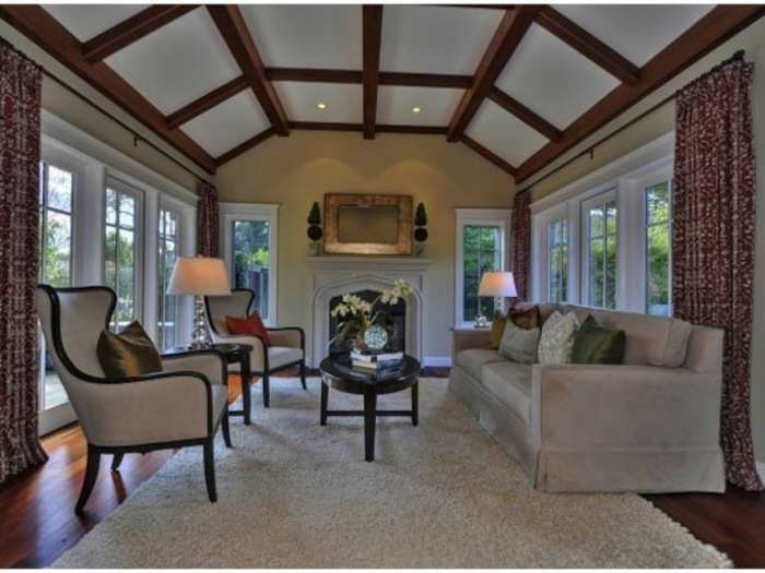 The gorgeous ceilings extend into the formal living spaces.