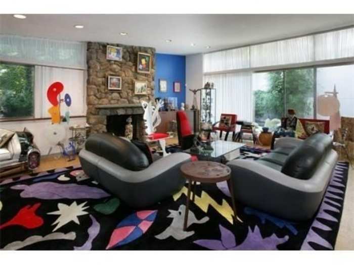 Harvard Law professor Alan Dershowitz is trying to sell his bizarrely decorated Cambridge home for $3.95 million.