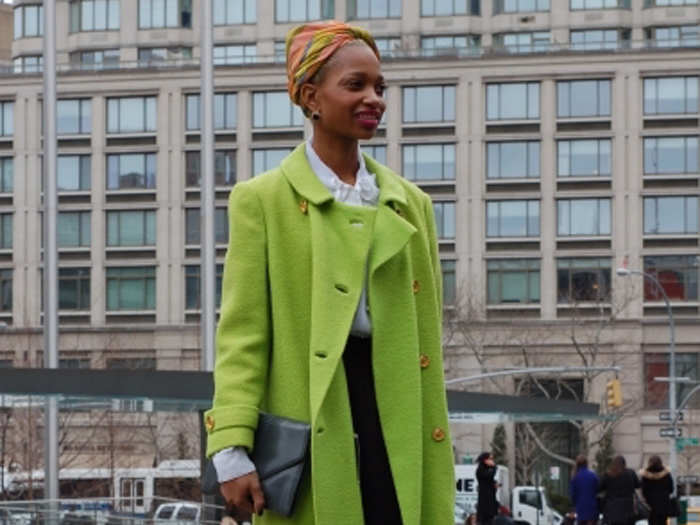 With her lime green jacket and bright turban, this stylish woman stood out from the crowd outside the tents at New York fashion week.