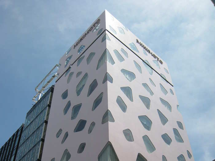 Mikimoto Ginza was completed in 2005 and is located in the Ginza shopping district in Tokyo. All the windows are different, giving the building the appearance of Swiss cheese.