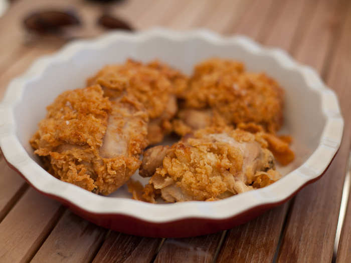 KENTUCKY: Bite into the crispy battered skin of a fried chicken leg. The original KFC is located in Corbin, but you can get great Kentucky fried chicken almost anywhere.