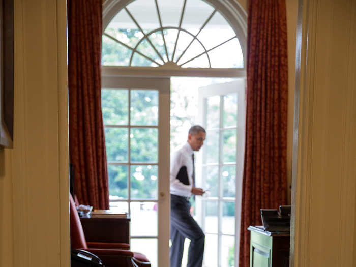 Bo, the Obama family dog, waits to greet Obama on June 11.