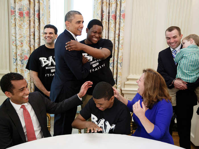 Obama greets Father