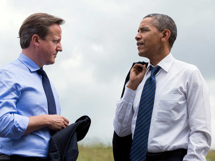 Obama and Cameron step aside for a talk during the G8 Summit.