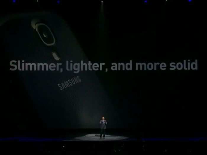 He brags some more about the phone, says its slimmer, lighter, and more solid than the S III.