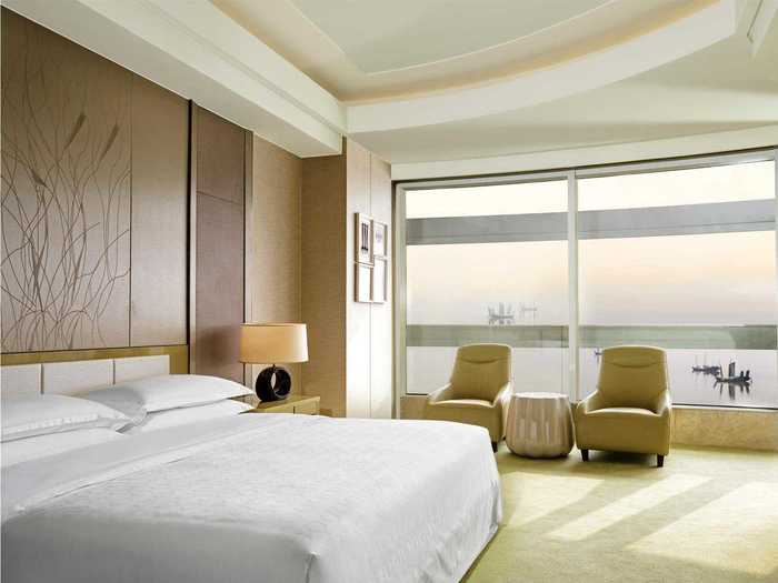 Each guest room, such as this Studio Suite, has high-tech features like LCD flat screen TVS and iPod docking stations.