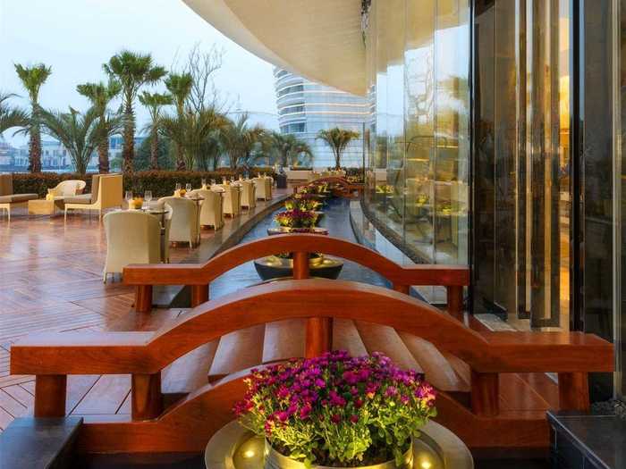 Diners at Feast can eat indoors or on the outdoor terrace overlooking the lake.