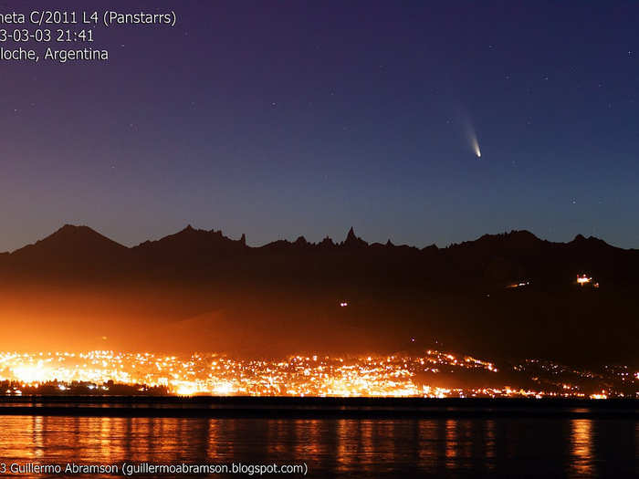 Pan-STARRS hangs above the shimmering city of Bariloche, Argentina, on March 3.