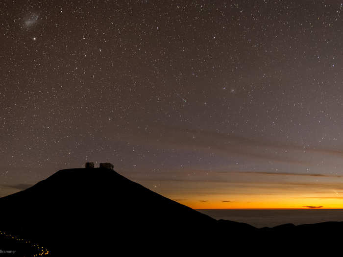 Two comets are seen in this image from the Paranal Observatory in Chile. From left to right: the Small Magellanic Cloud is the cluster top left, Comet Lemmon is shooting across the center of the shot and Pan-STARRS is way off to the right in the distance, drifting into the sunset.