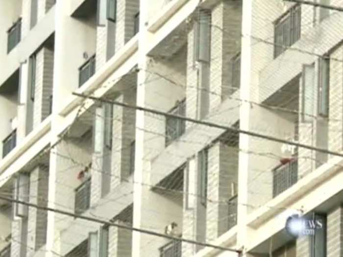 Businesses hang nets to prevent employees from committing suicide.